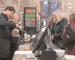 image: Alison Brown Serving customers at an event
