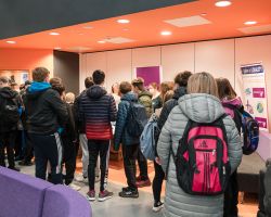 photo of young people queuing up to register at youth matters conference