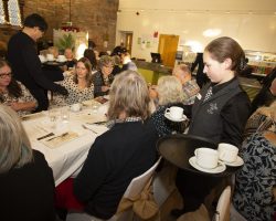 Phew coffee time Guests are served with cups and saucers at their tables and the waiters and waitresses pour tea and coffee